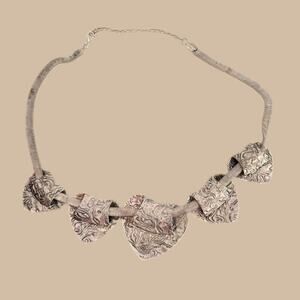 UNIQUE SILVER TONED HEART NECKLACE